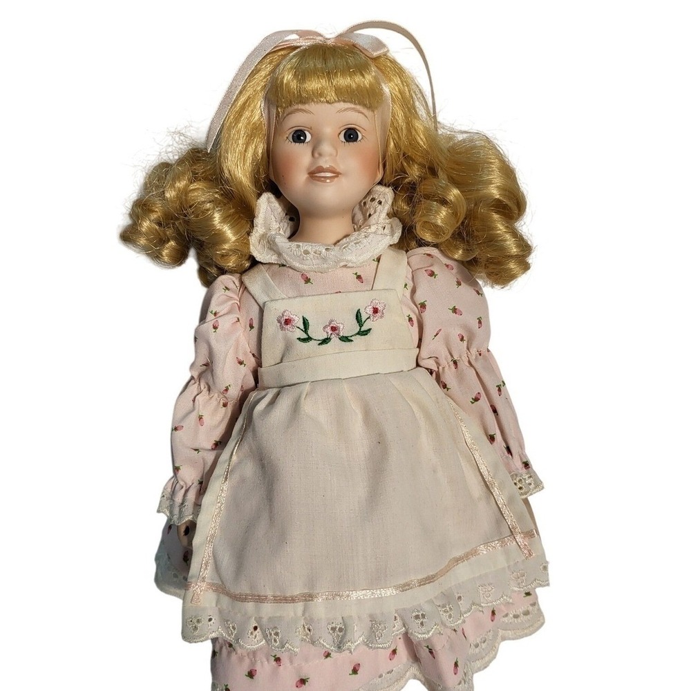 Royalton collection Porcelain Doll Blonde Curly Hair Blue Eyes Pink Dress